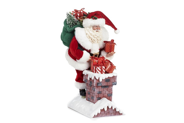 Kerstman op schoorsteen